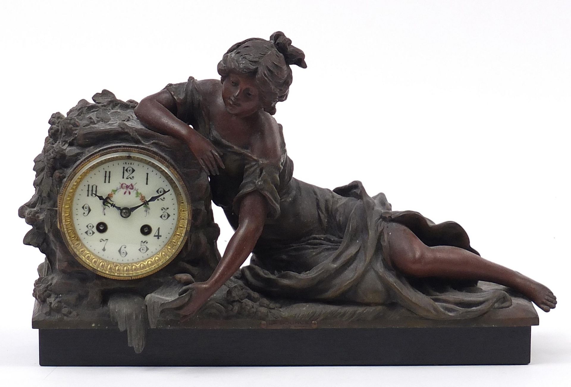 Art Nouveau spelter maiden design mantle clock with circular enamel dial having