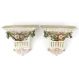 Pair of 19th century porcelain floral encrusted shelf brackets hand painted with lovers and flowers,