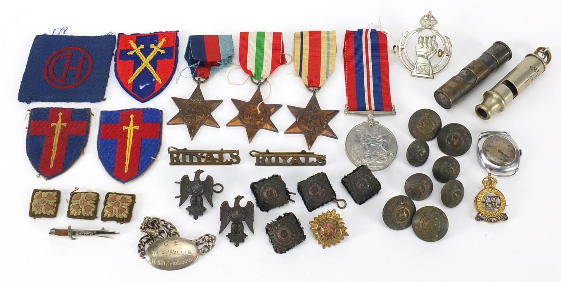 Militaria including World War II stars, Weingarten's wristwatch, Totem lighter and buttons