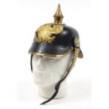 German military interest Pickelhaube with brass chin strap and leather liner