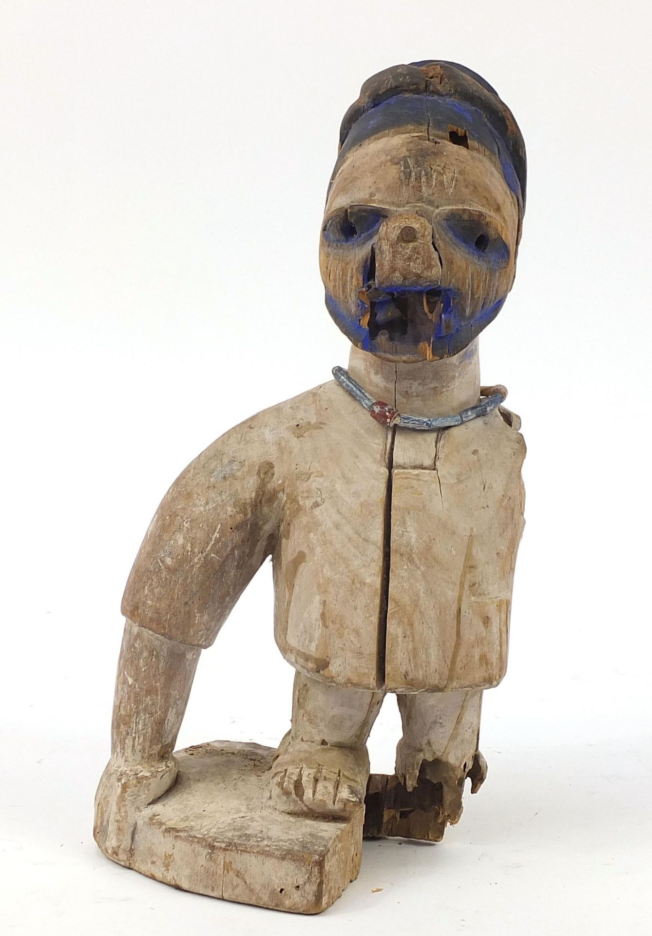 Tribal interest carved wood figure, possibly from New Guinea, 35cm high