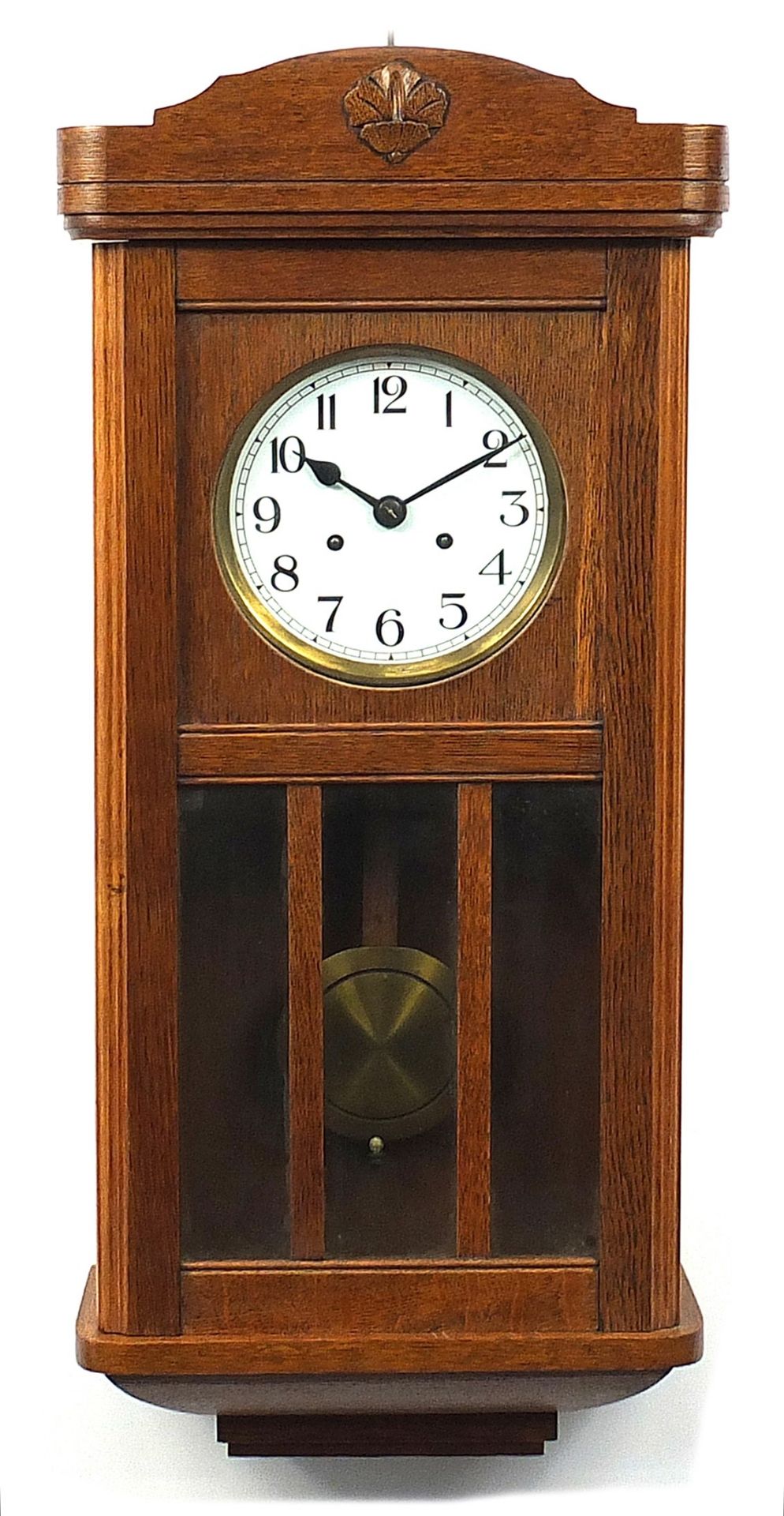Oak cased wall clock with circular dial having Arabic numerals, 77cm high
