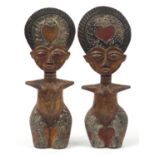 Pair of African tribal interest carved hardwood fertility figures, each 37.5cm high