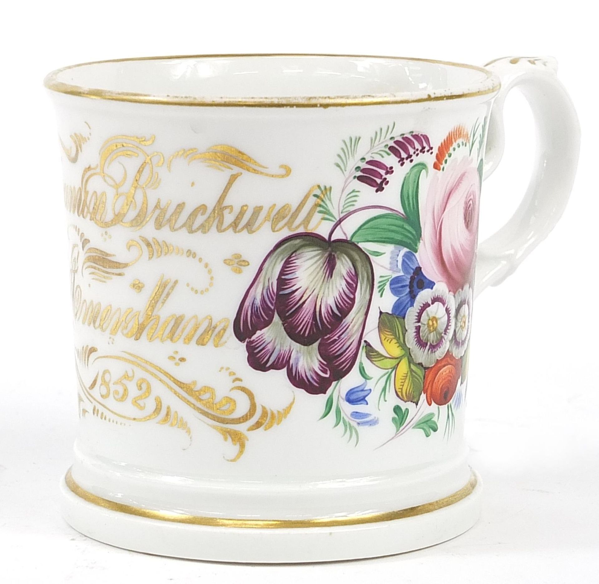 Mid 19th century porcelain mug hand painted with flowers, inscribed Benjamin Bruckwell Amersham