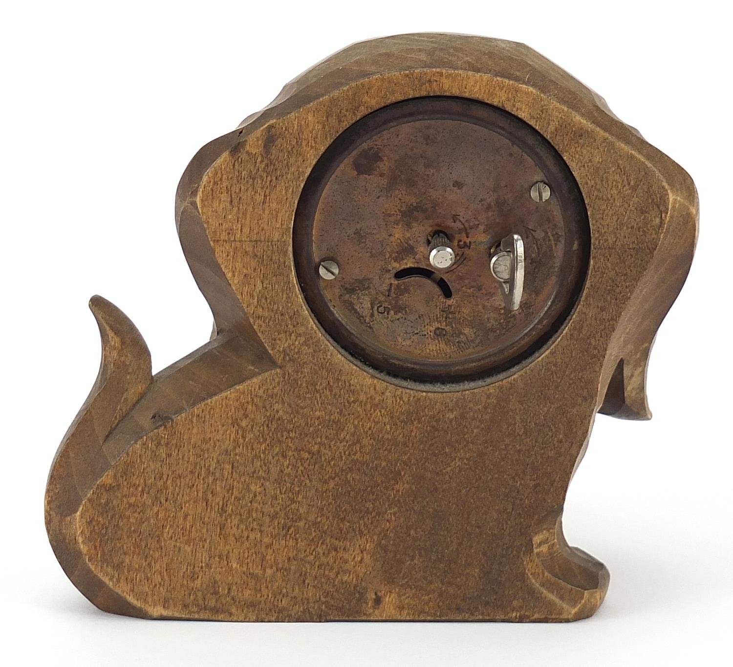 Novelty carved Black Forest clock with moving eyes in the form of a dog, 11.5cm wide - Image 2 of 3