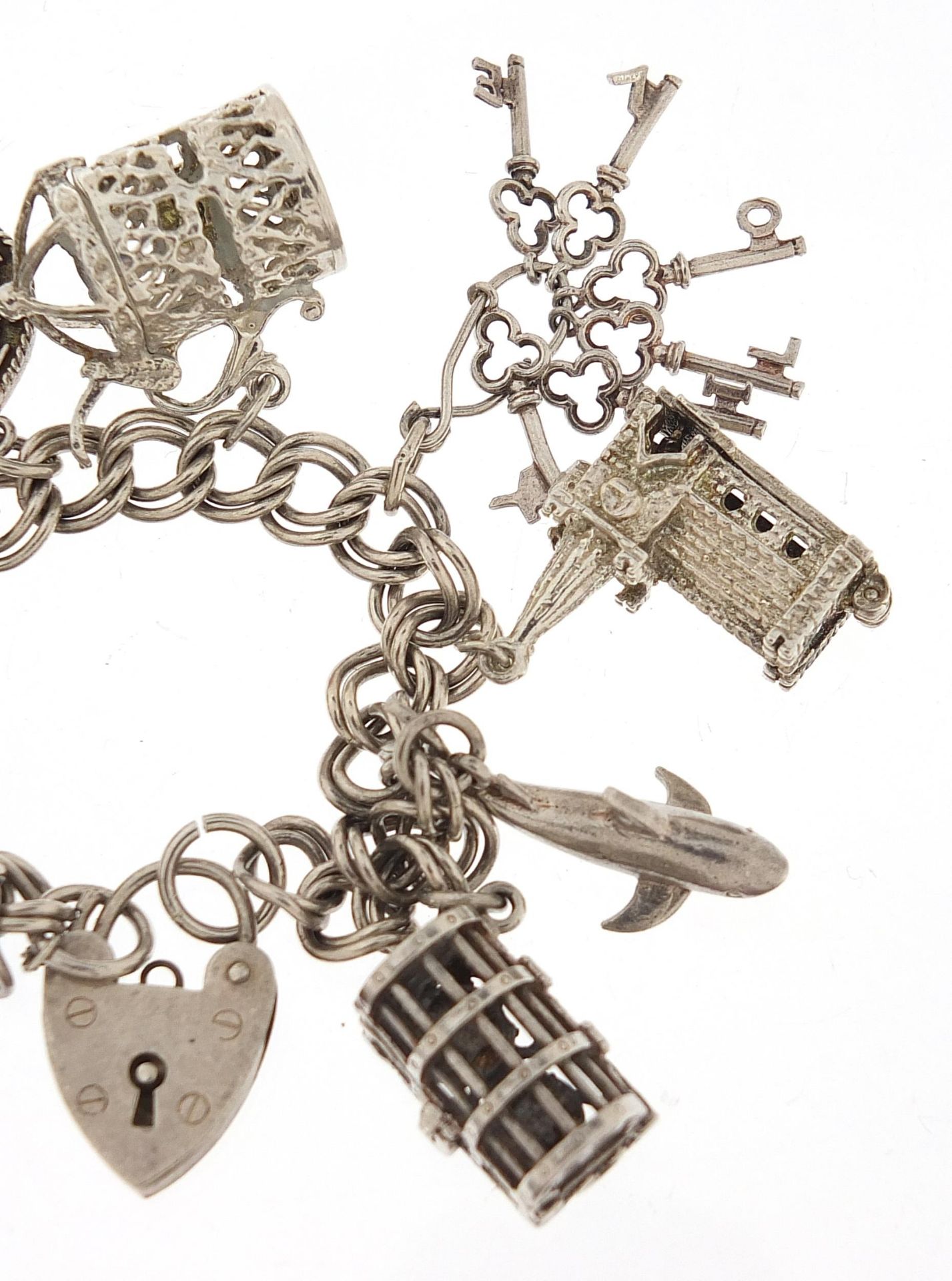 Silver charm bracelet with a selection of mostly silver charms including Concorde, 16cm in length, - Bild 3 aus 5