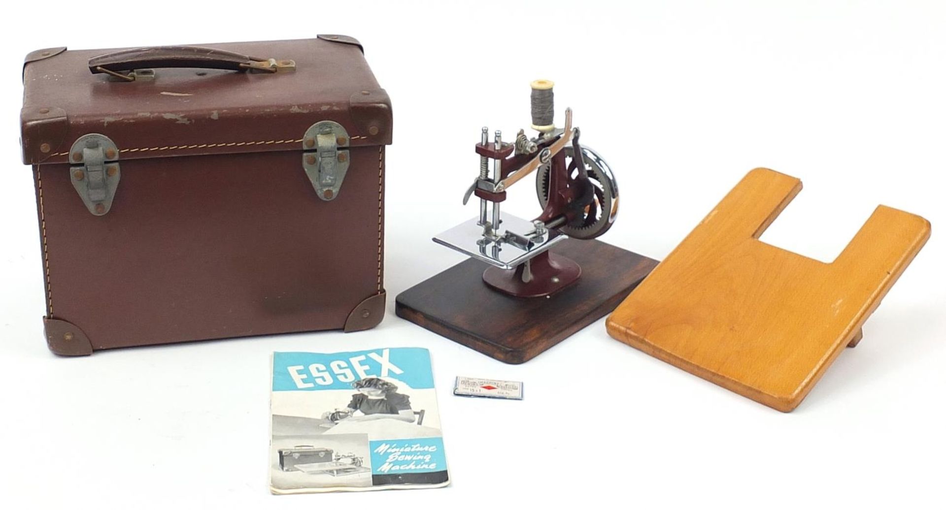 Vintage Essex child's sewing machine with case and instructions