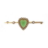 Unmarked gold green stone and seed pearl love heart bar brooch housed in a Searle & Co Ltd London