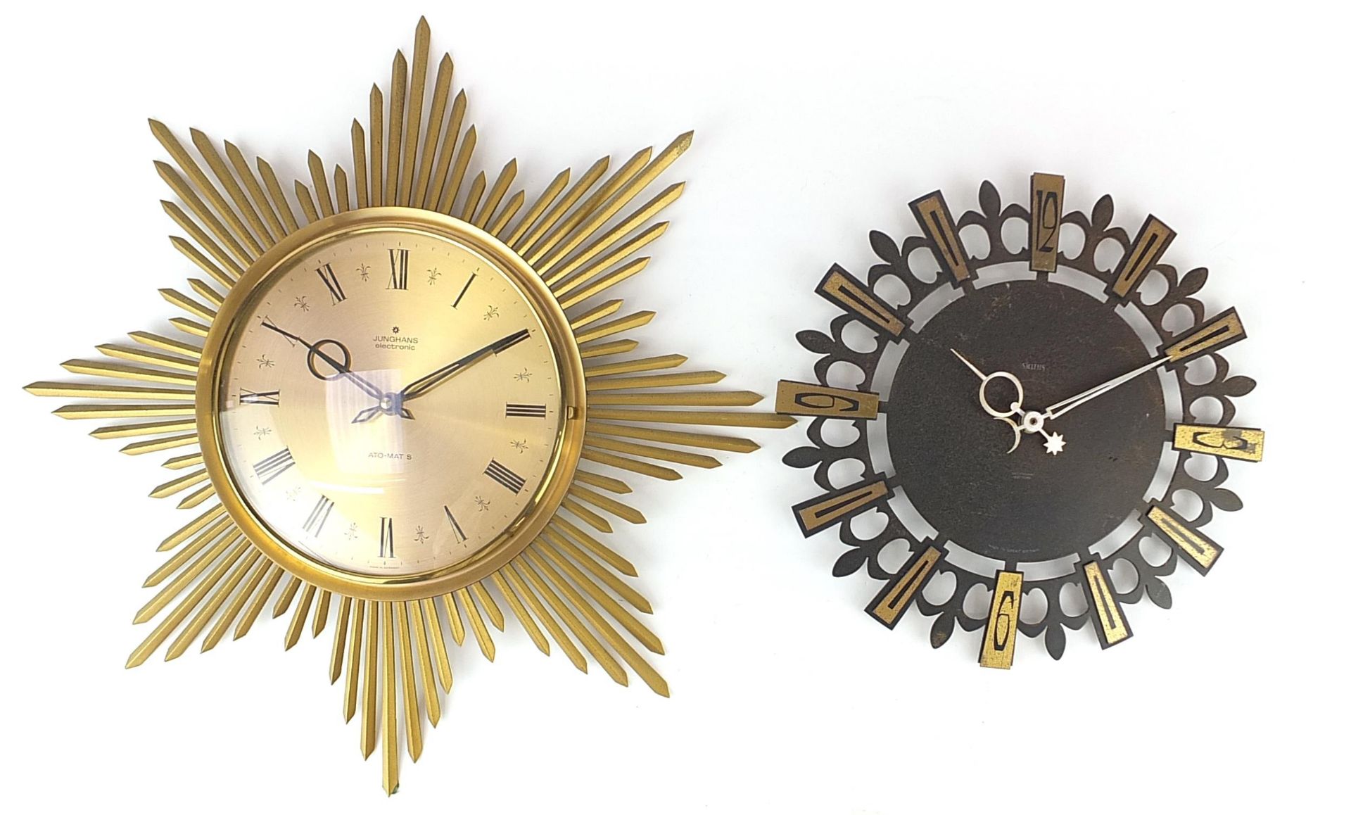 Two vintage wall clocks comprising Junghans electronic Sunburst and Smiths Sectronic, the largest