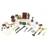 Sundry items including boxes, horn salad servers, trinket boxes carved stone animals and a fan