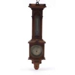 Negretti & Zambra, carved walnut wall barometer with silvered dial numbered 9153, 66cm high