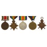 Five British military World War I medals including a Mons Star awarded to 49736GNR.R.OCKWELL.R.F.