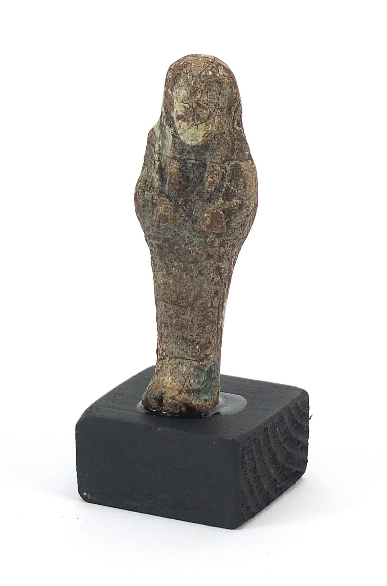 Egyptian style ushabti raised on a wooden base, overall 9cm high