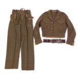 British military interest uniform and leather belt, the jacket and trousers with labels dated 1949