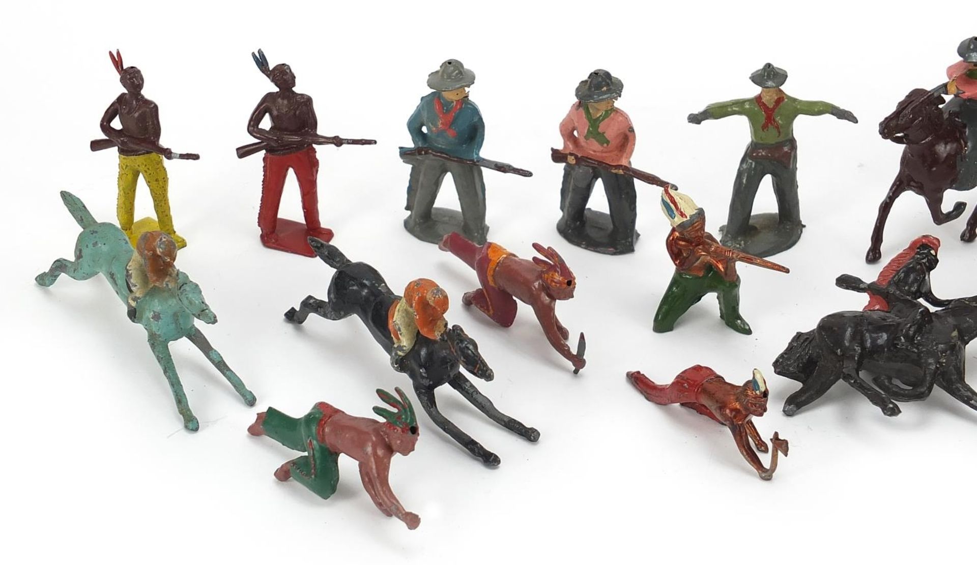 Vintage hand painted lead figures including cowboys, Indians and jockeys on horseback, the largest - Image 2 of 3