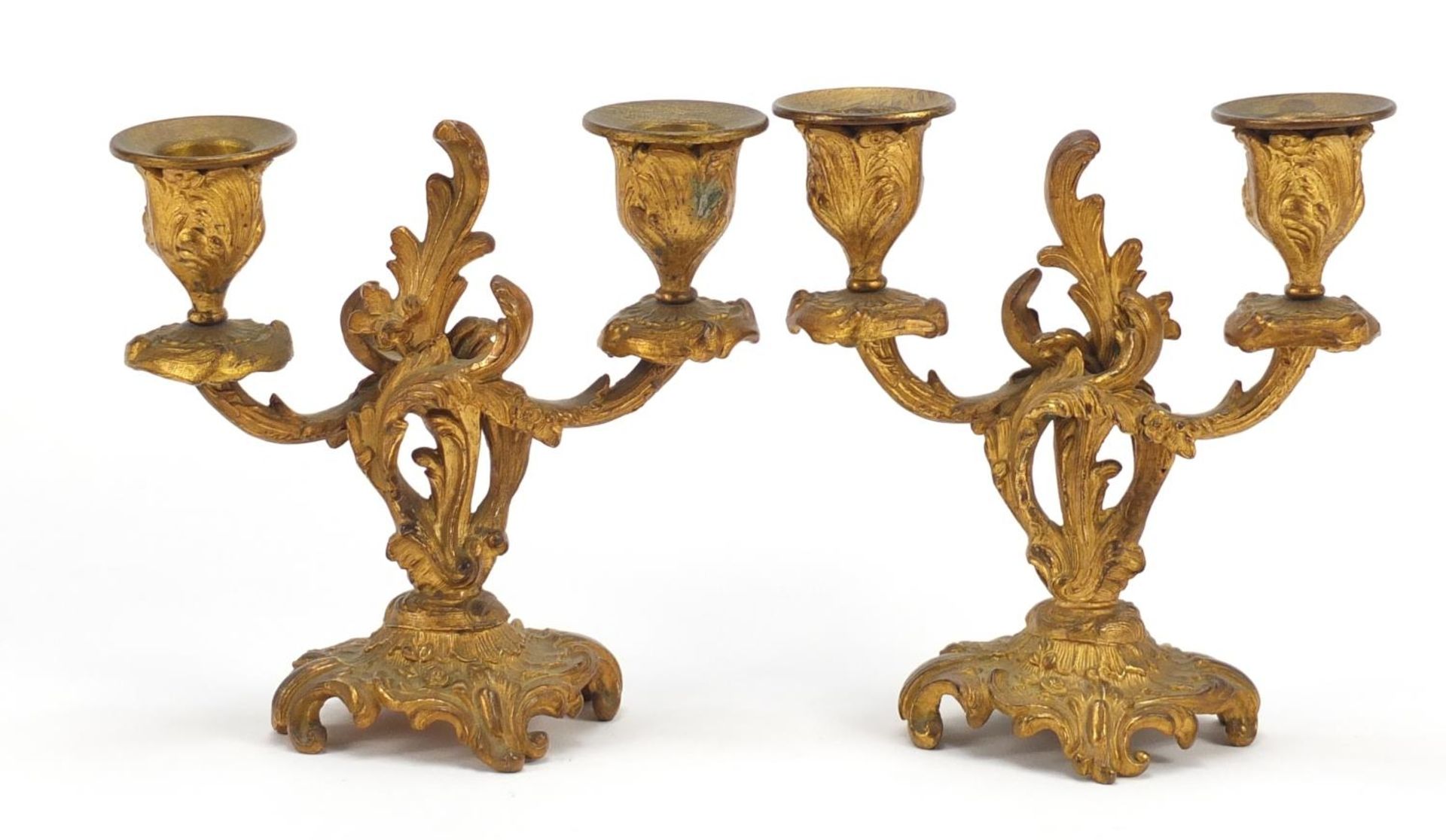 Pair of Rococco style gilt metal two branch candlesticks, each 15cm high Both are in generally - Image 2 of 3