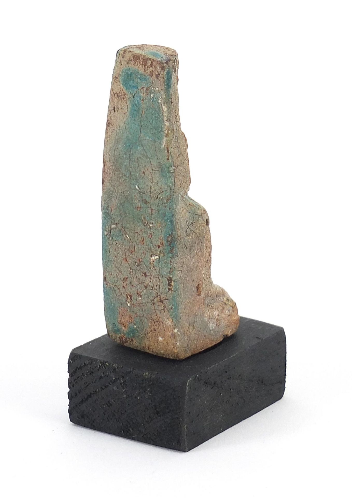 Egyptian style stone figure raised on a wooden base, overall 10cm high - Image 2 of 3