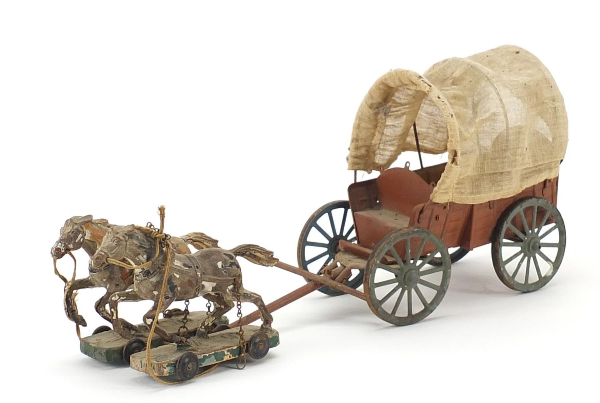 Vintage tinplate wagon with horses, 36cm in length