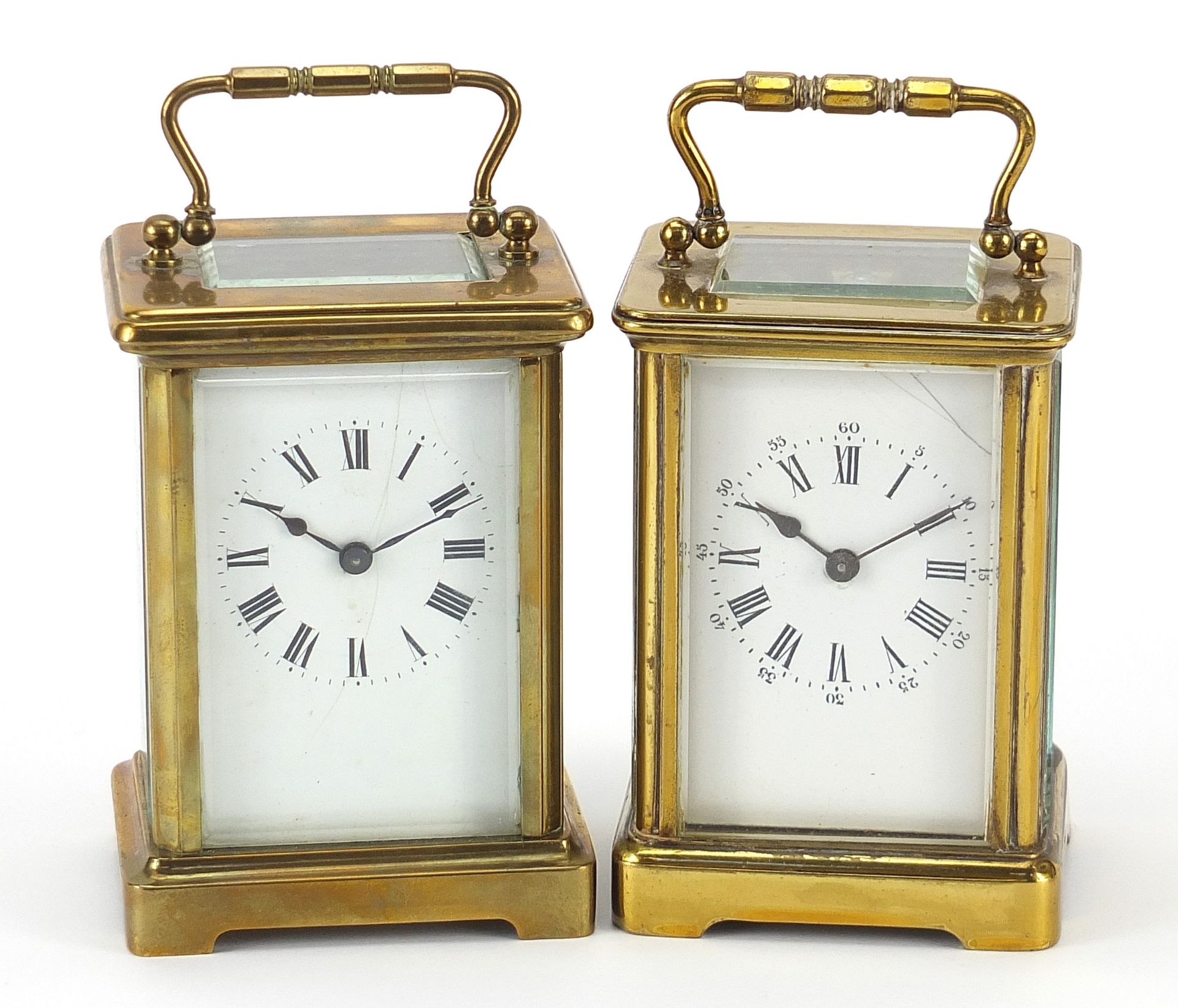 Two brass cased carriage clocks with enamel dials, each approximately 11cm high Both clocks wind and