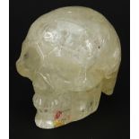 Rock crystal carving of a human skull, 10cm in length Appears to be in good general condition. No