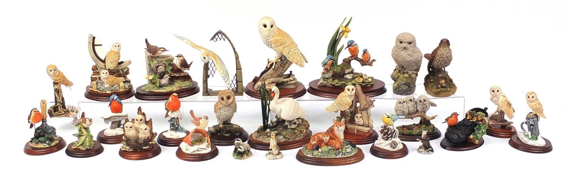 Predominantly Border Fine Arts model animals on stands including birds and a group of foxes titled