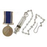 Elizabeth II Exemplary Police Service medal with whistle, the medal awarded to Sergeant Gloria Kevis