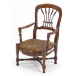 Antique elm child's chair with rush seat, 48cm high