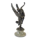 Patinated bronze study of a winged figure carrying a nude figure, raised on a marble base, 29cm high