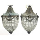 Pair of ornate bronzed metal chandeliers, 50cm high