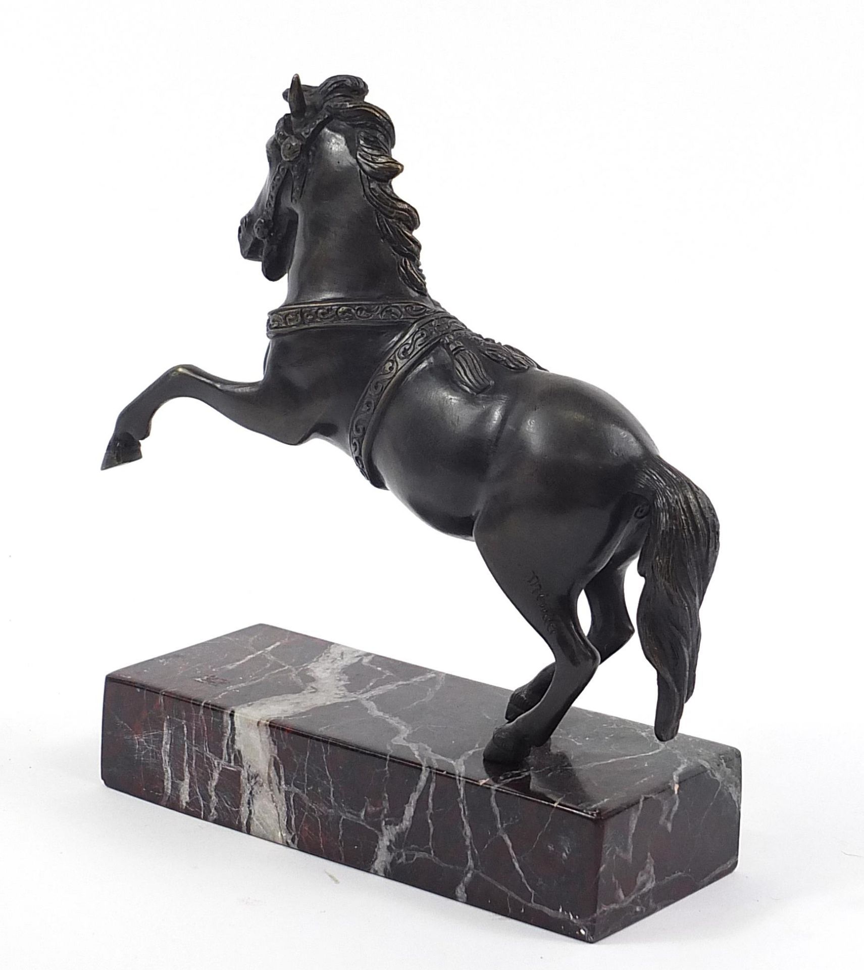 After Minati, patinated bronze rearing horse raised on a marble base, 24cm high Overall in generally - Image 2 of 4