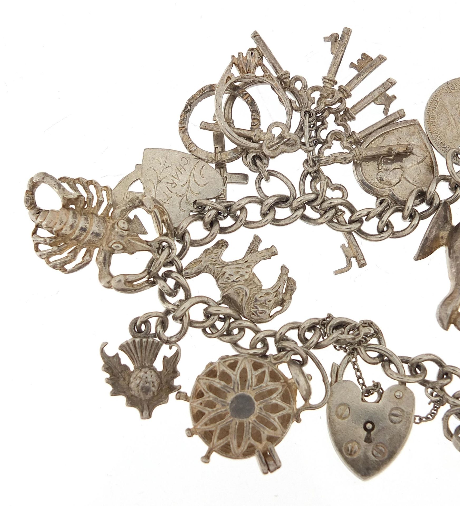 Silver charm bracelet with a selection of mostly silver charms, 49.0g - Bild 2 aus 5