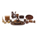 Woodenware including a Victorian rosewood tea caddy with twin divisional interior, carved fruit,