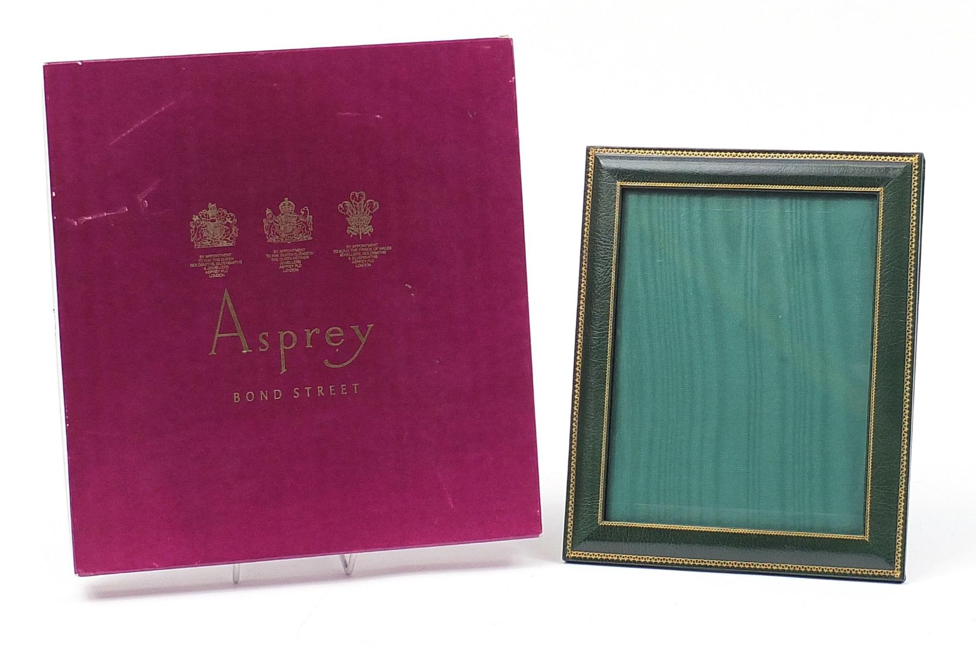 Asprey tooled leather easel photo frame with box, 28.5cm x 23.5cm, aperture size 22.5cm x 17.5cm