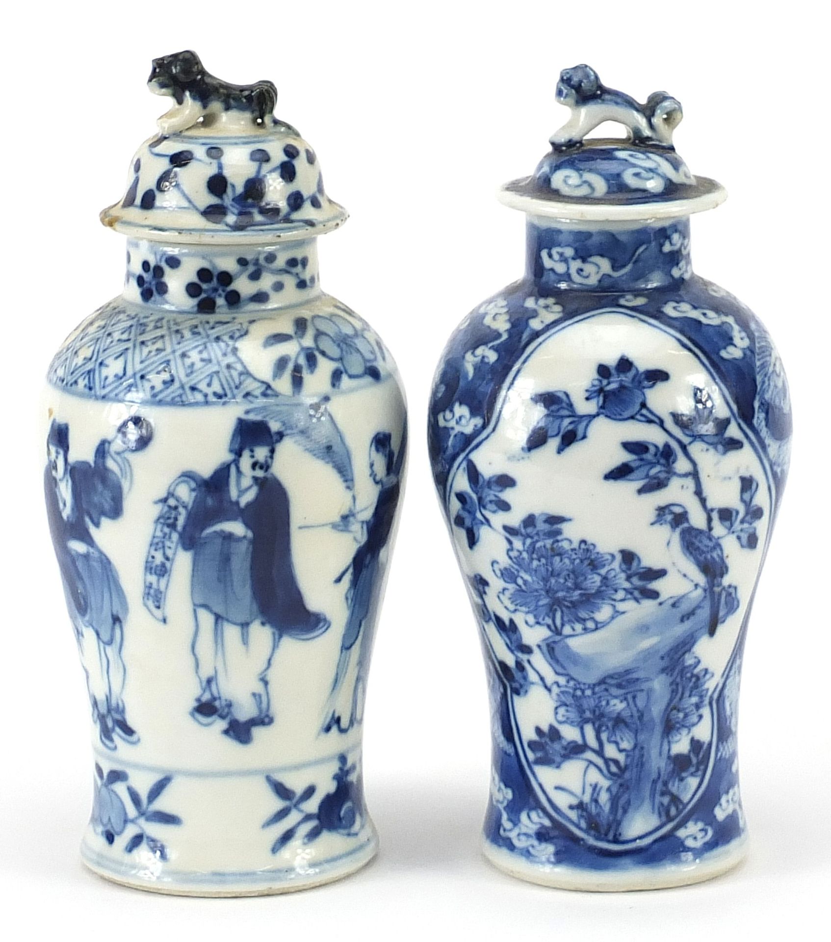 Two Chinese blue and white porcelain baluster vases with covers, hand painted with birds amongst
