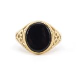 9ct gold black onyx signet ring with pierced shoulders, size V, 4.3g