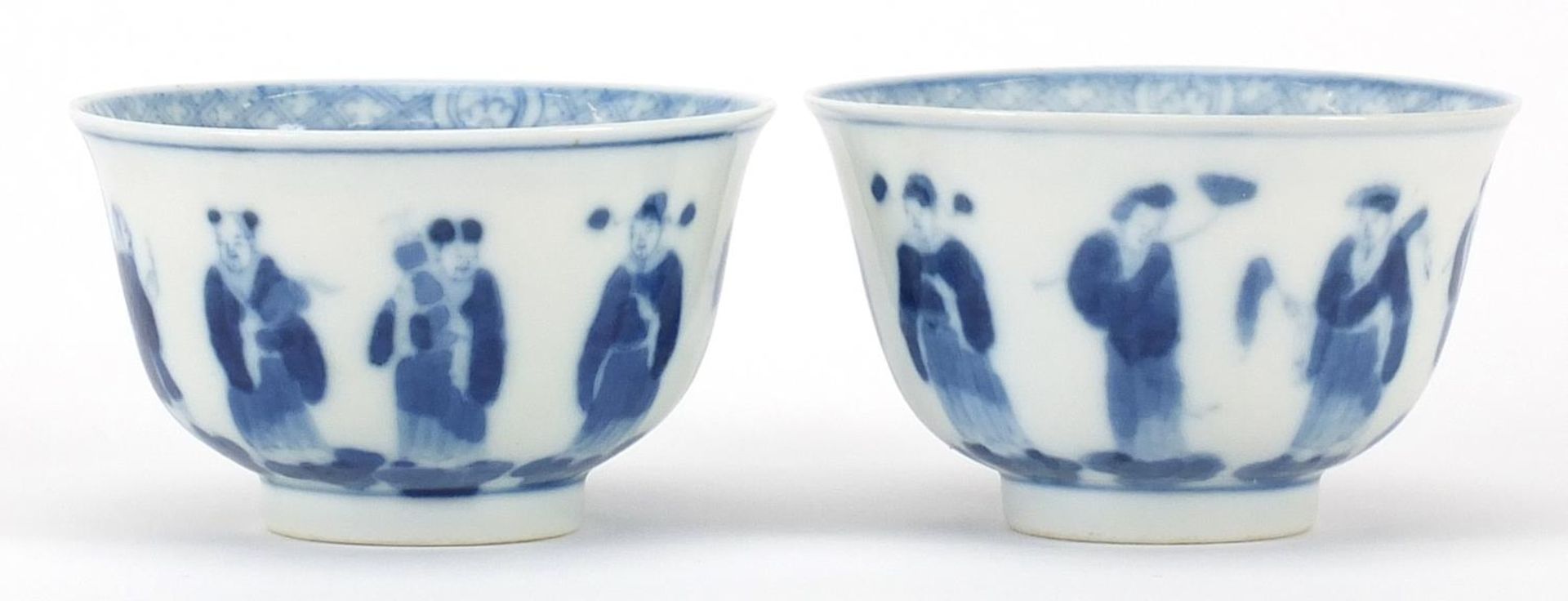 Pair of Chinese blue and white porcelain tea bowls hand painted with figures, four figure