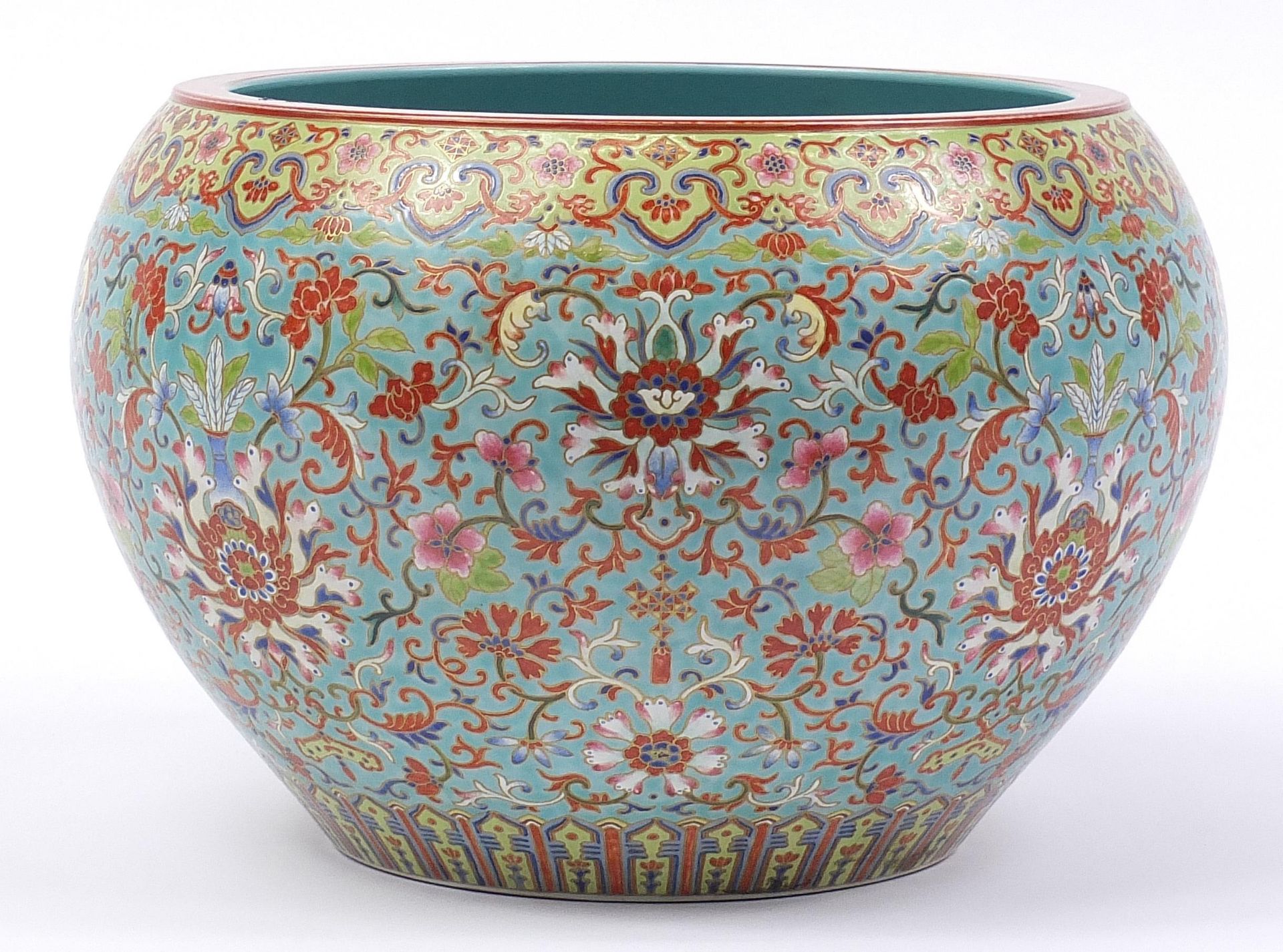 Large Chinese turquoise ground jardiniere finely hand painted in the famille rose palette with