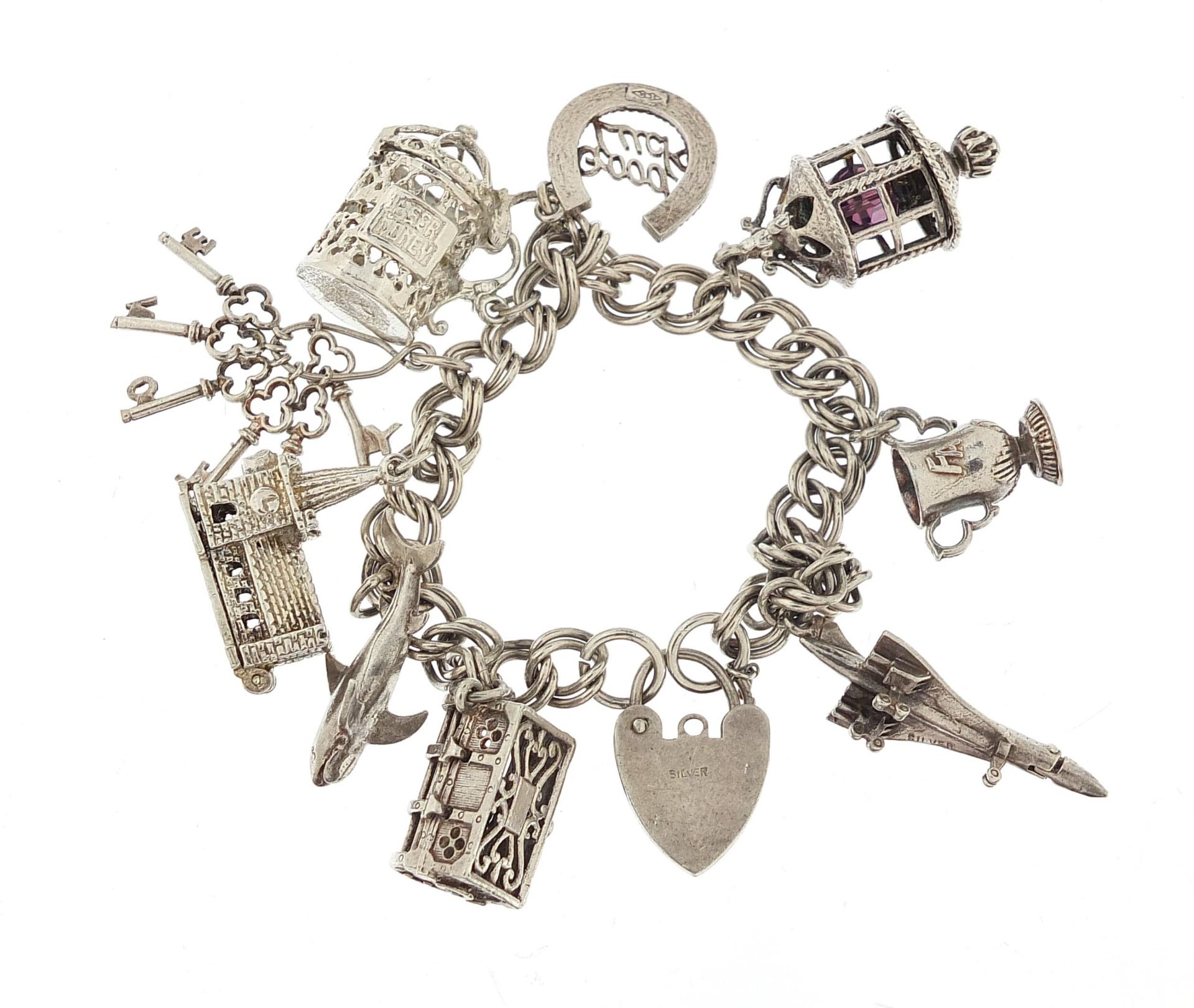 Silver charm bracelet with a selection of mostly silver charms including Concorde, 16cm in length, - Bild 4 aus 5