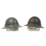 Two British military interest Zuckerman Civil Defence helmets