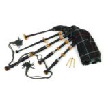 Set of Scottish bagpipes with pipe bag, some pieces stamped R G Hardi