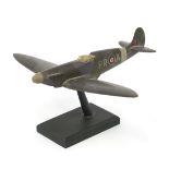 Military interest hand painted wooden model of a Spitfire, inscribed made by Flight Lieutenant Ralph