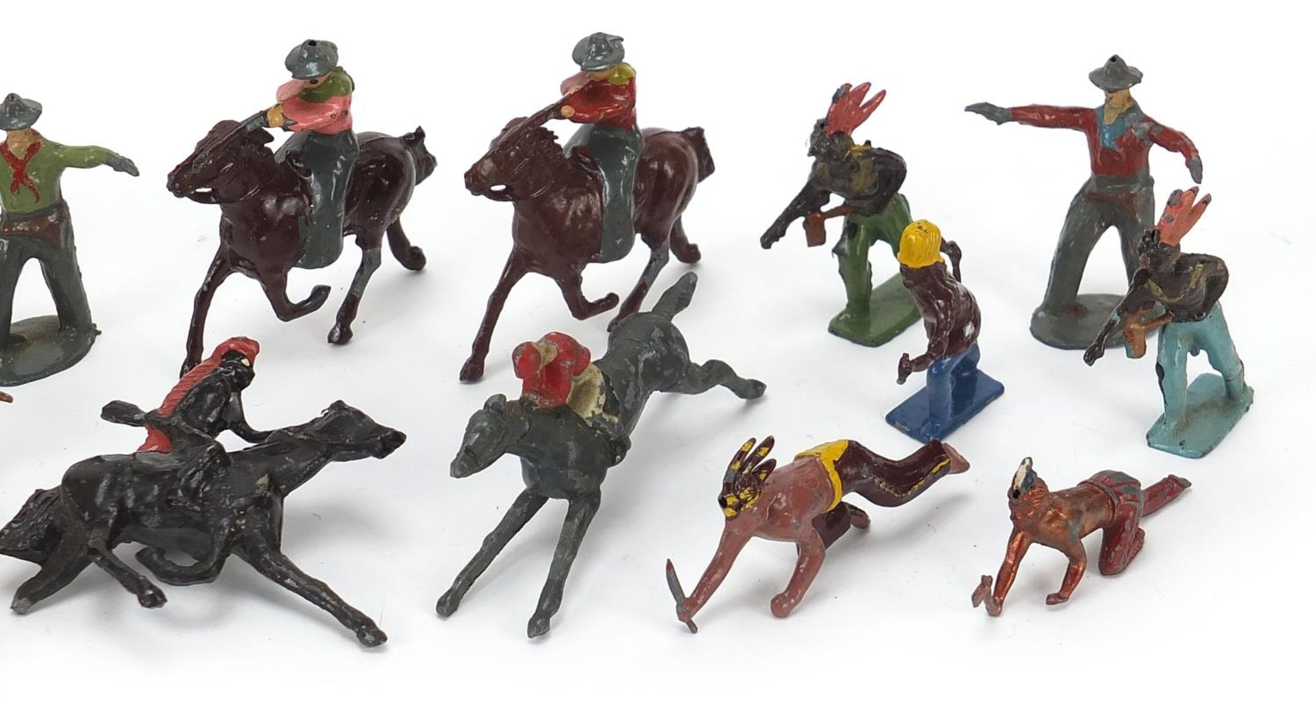 Vintage hand painted lead figures including cowboys, Indians and jockeys on horseback, the largest - Image 3 of 3