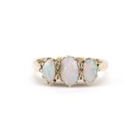 9ct gold cabochon opal three stone ring, size N, 3.0g