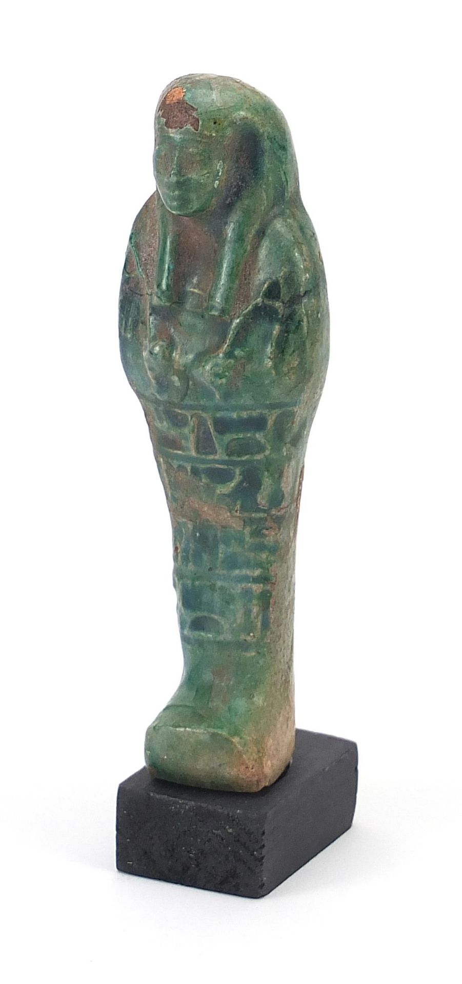 Egyptian style ushabti raised on a wooden base, overall 16.5cm high