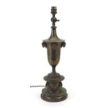 Antique brass Regency design adjustable table lamp with ram's heads, 47.5cm high Overall in