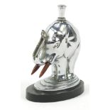 Ronson, Art Deco chrome table lighter in the form of an elephant raised on an oval art metalworks