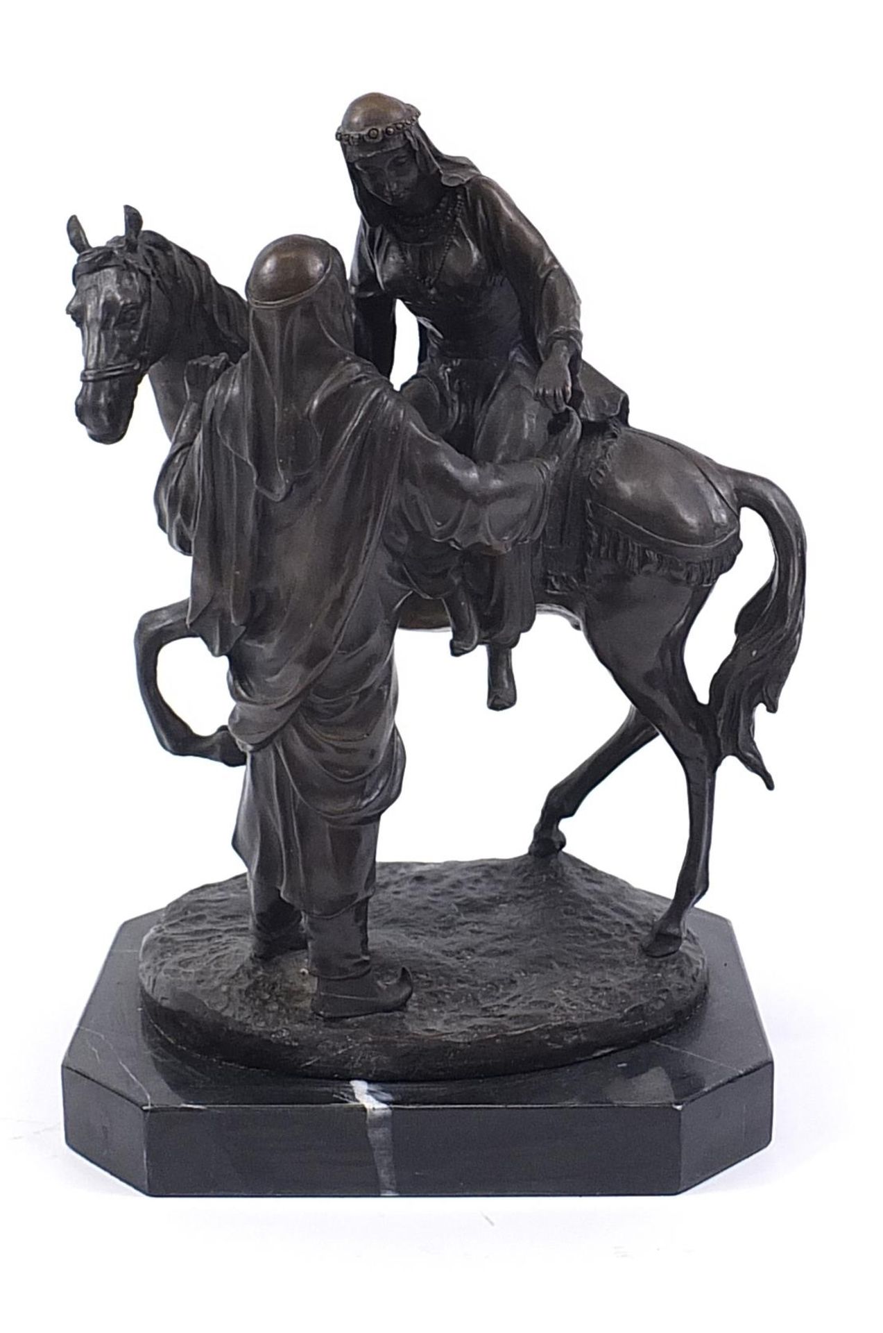 Large patinated bronze study of a Arab gentleman attending a lady, raised on a black marble base,