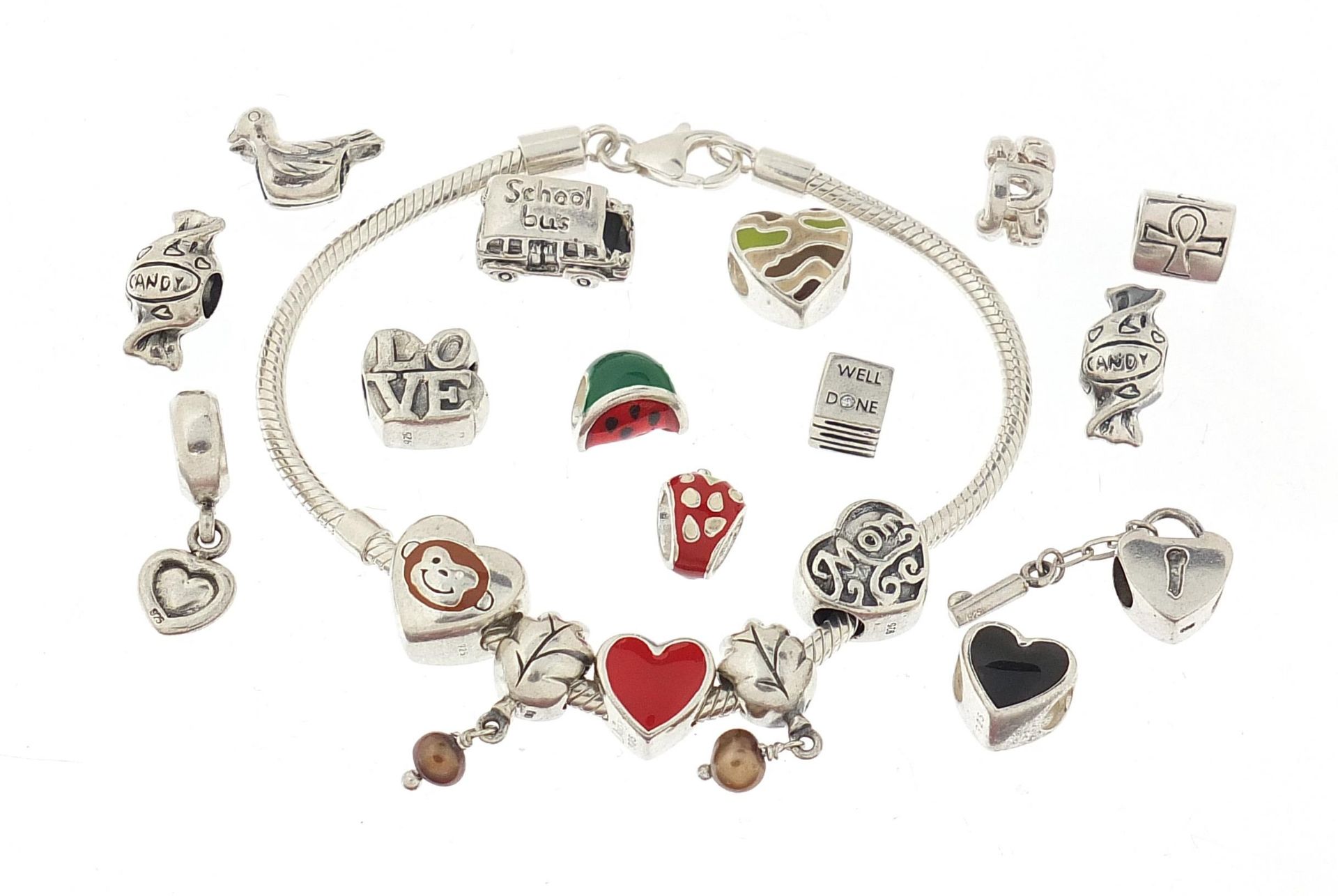 Pandora design Silver charm bracelet with a selection of silver charms, some enamel, the bracelet