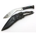 Gurkha's Kukri knife with leather sheath and horn handle, 31cm in length