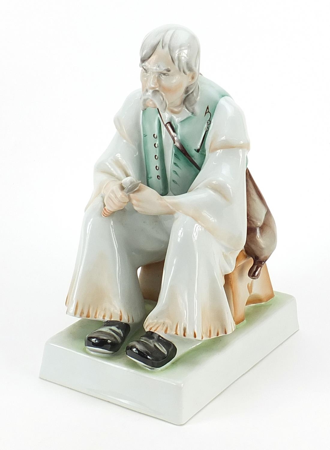 Zsolnay Pecs, Hungarian porcelain seated gentleman, 32cm high